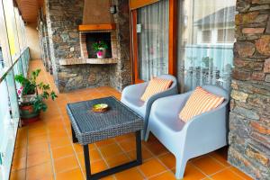 Posezení v ubytování Amplio ático con terraza en Andorra centro