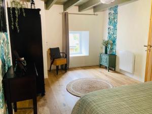 Posteľ alebo postele v izbe v ubytovaní Magnifique Maison Familiale