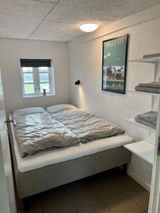 Postel nebo postele na pokoji v ubytování På landet