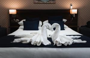 Letto o letti in una camera di Kings Croft Hotel