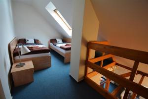 Voodi või voodid majutusasutuse Hotel Churáňov toas