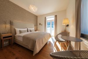 Voodi või voodid majutusasutuse Hotel Edelweiss toas