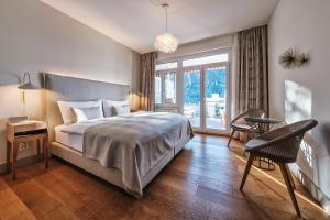 Voodi või voodid majutusasutuse Hotel Edelweiss toas