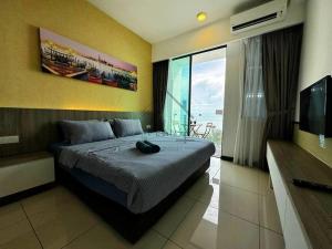 PD D'Wharf Duplex 3BR - Full Seaview (Up To 12 Pax)客房内的一张或多张床位