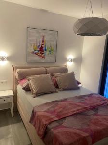 Posteľ alebo postele v izbe v ubytovaní M&M apartment