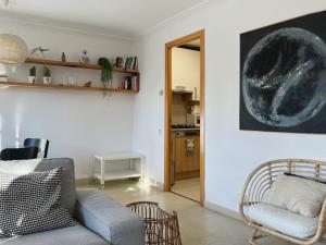 a living room with a couch and a chair at Stay U-nique Apartments Borbó in Barcelona