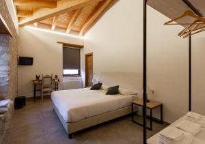 A bed or beds in a room at Tenuta San Martino