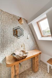 a bathroom with a sink and a window at Chyża Chata 130m2 in Bystre