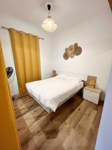 Ένα ή περισσότερα κρεβάτια σε δωμάτιο στο Le Cosy