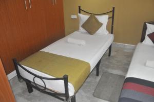 Letto o letti in una camera di Power Zone Guest House