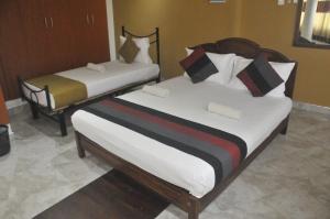 Letto o letti in una camera di Power Zone Guest House