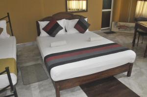 Letto o letti in una camera di Power Zone Guest House