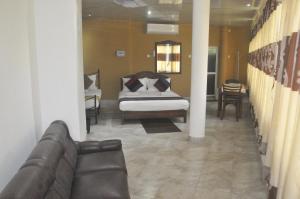 Area soggiorno di Power Zone Guest House