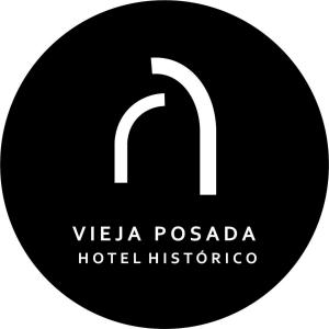 a black and white sign with a hotel logo at Vieja Posada Hotel Histórico in Cafayate