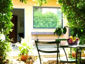 A garden outside Classic Hotel