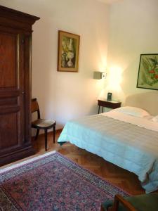 A bed or beds in a room at Classic Hotel