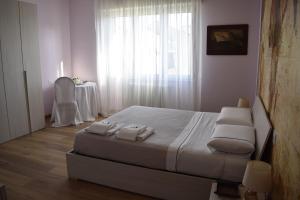 Postel nebo postele na pokoji v ubytování Villa Giulini Rho