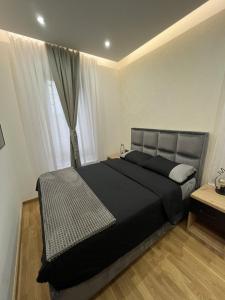 Una cama o camas en una habitación de Apartman Sara - DivčiNova