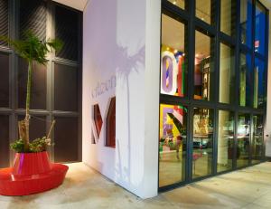 a store front with a potted plant in front of it at citizenM Miami Brickell in Miami