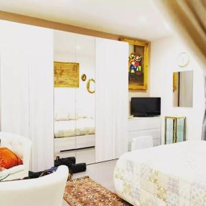 TV a/nebo společenská místnost v ubytování First House Posillipo