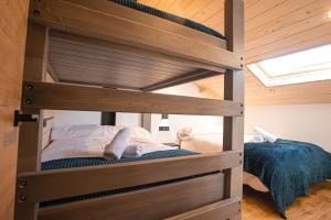 Posteľ alebo postele v izbe v ubytovaní APARTAMENTO BLOSSOM