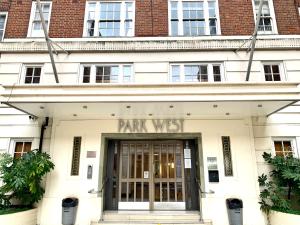 a building with the entrance to the park west building at The G Spot - 1 Bedroom Apartment Edgware Road Central London in London