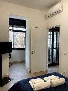 A bed or beds in a room at Modern Apartment in Rome - S.Paolo