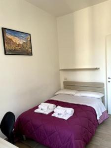 A bed or beds in a room at Modern Apartment in Rome - S.Paolo