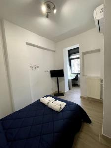 A bed or beds in a room at Modern Apartment in Rome - S.Paolo