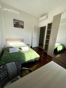 A bed or beds in a room at Modern Apartment in Rome - S.Paolo