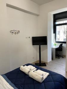 A bed or beds in a room at Modern Apartment in Rome - S.Paolo