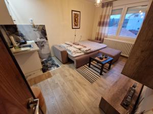 เตียงในห้องที่ Grey & Sunny Apartments Zaječar