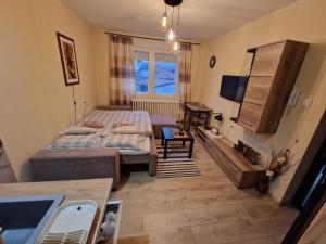 เตียงในห้องที่ Grey & Sunny Apartments Zaječar