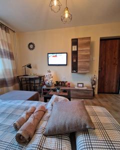 เตียงในห้องที่ Grey & Sunny Apartments Zaječar