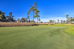 a view of the green at memorial golf course at Myrtle Beach Condo in Tidewater with Pool and Golf! in North Myrtle Beach