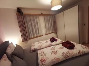 Postel nebo postele na pokoji v ubytování Ferienwohnung Aquileia