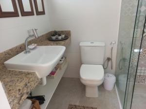 Ένα μπάνιο στο Apartamento Em Condominio Residencial Familiar +12 φωτογραφίες