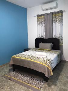 Postel nebo postele na pokoji v ubytování Hostal Magisterial Santo Domingo