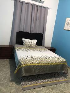 Postel nebo postele na pokoji v ubytování Hostal Magisterial Santo Domingo