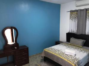 Postel nebo postele na pokoji v ubytování Hostal Magisterial Santo Domingo