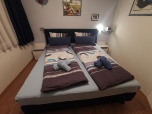 Postel nebo postele na pokoji v ubytování Ferienwohnung Aquileia