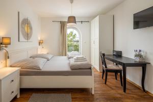 Postel nebo postele na pokoji v ubytování Villa Perla + 37 fotografií