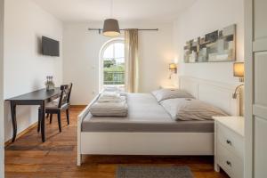 Postel nebo postele na pokoji v ubytování Villa Perla