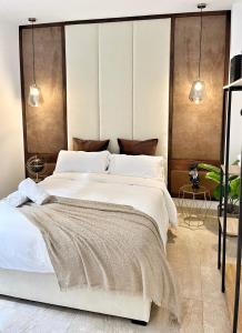 Posteľ alebo postele v izbe v ubytovaní Tennessee Urban Suites