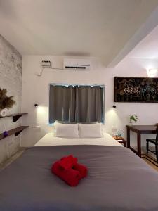 Una cama o camas en una habitación de Namaste Jungle - A Boutique Homestay