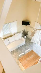 Posezení v ubytování Casa Alegria Beach Cottage