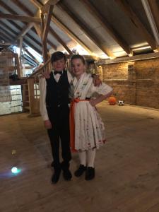 a man and a woman in costumes posing for a picture at Ferienwohnung Kunz in Burg