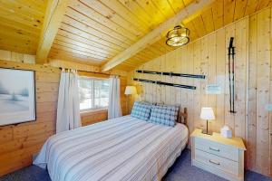 מיטה או מיטות בחדר ב-Keller's Mountain Cabin
