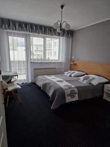 Posteľ alebo postele v izbe v ubytovaní Pokoje Gościnne Zych + 14 fotografií