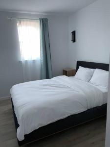 Postel nebo postele na pokoji v ubytování Bromont Lodge